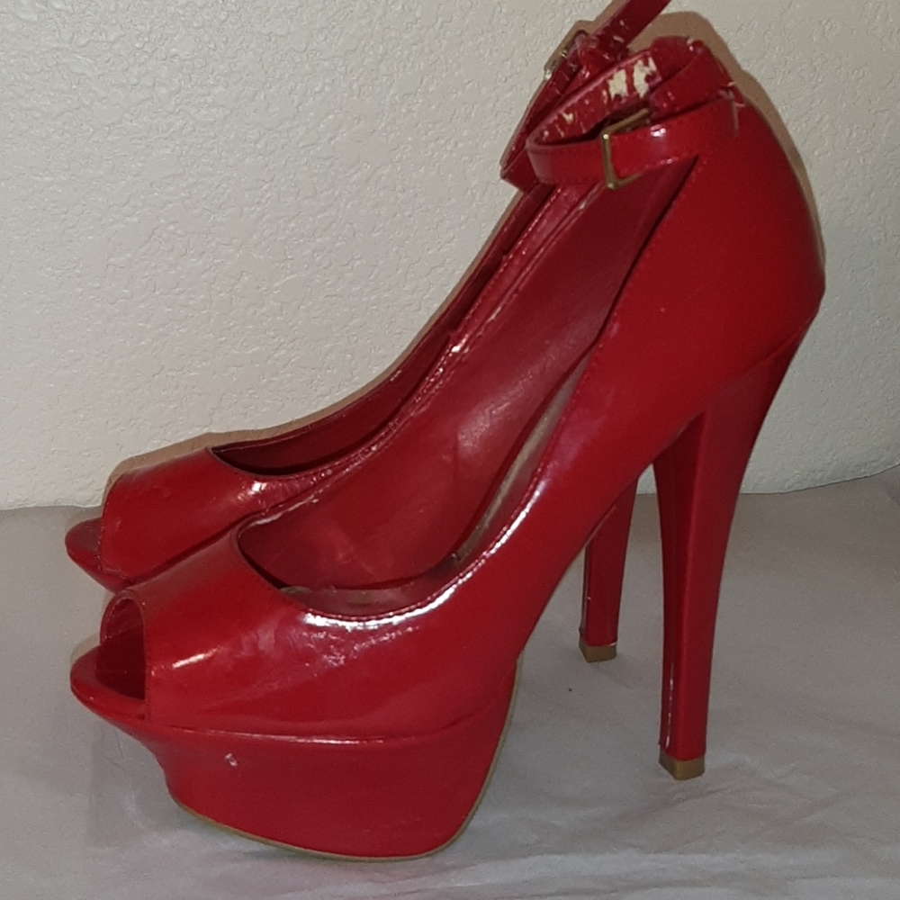 Lightly used patent red platform heels size 7 1/2m